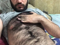 Preparing to stroke myself by playing with my hairy body