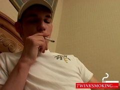 Seductive Smoking Twink Indulges in Sensational Threesome