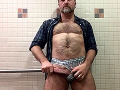 unshaved father undresses and Strokes His Hard Cock