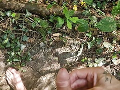 Me pissing naked in the forrest with my uncut cock