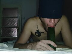 Deep sucking a huge cucumber