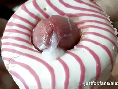 Horny skinny teen fucks a donut with a big dick