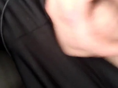 Beefy man is draining off during driving a van