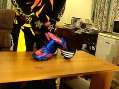 Football boot cum & take up with the tongue in MX gear