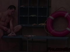 Andrej gulps down Michal's uncut cock in the middle of a public pool