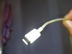 USB cable recharges dick and squirts cum all over body