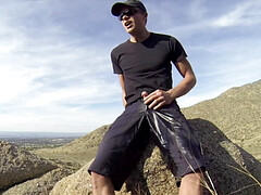 Risky shorts pissing on a hiking trail