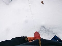 Boy pee in the snow