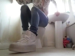 Crossdresser in cock-squeezing Denim and Sneakers