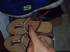 Cum on her sandals at night at the entrance