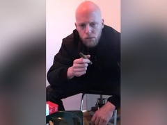 Cigar smokin' skinhead