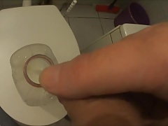 Two friends pissing in one bottle (peeing)