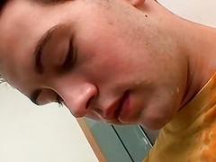 Naughty twink pissing all over his shirt while jerking off
