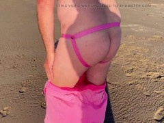 I reveal my sissy on the beach with her naive innocence