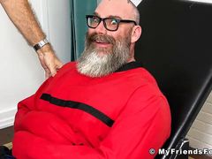 Bound hunk with big beard endures tickling torment from dom