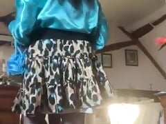 In turquoise blouse