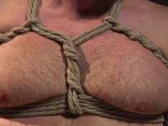 Full cock domination while the male slave sits tied up to the table