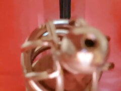 cock in cage with wand massage stick