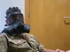 Army twunk milking off in his gas mask
