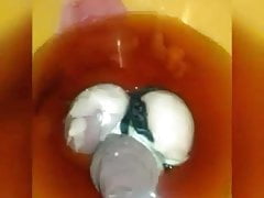 Slave has his dick filled in wax