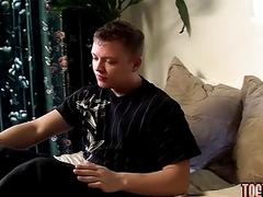 Jock teases with his feet and strokes his hard cock