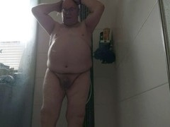Grandpa enjoys playing with huge tits in the shower