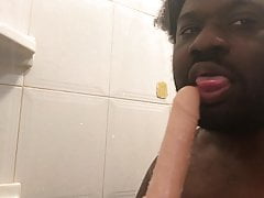 Sucking a didlo in the shower