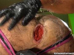 Dolan Wolf stretched and opened wide by Dylan Saunders deep fisting