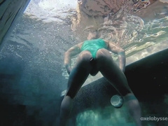 Axel Abysse knuckles his gash by the pool