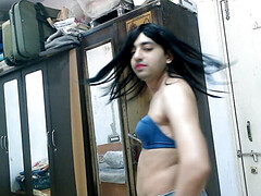 Behind the scene of Sweet Lollipop's video production in denim-backless bra.