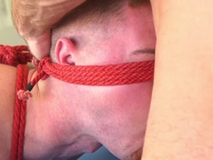 Slender boy gets tied up and seduced in rough bondage fetishes