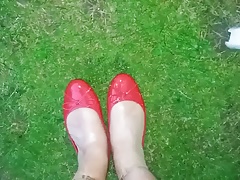Piss in red ballet flats